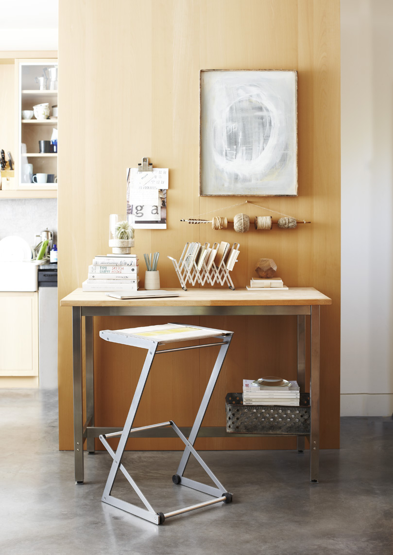 Desk and firehose stool in modern house with framed art Sean Dagen Photography 