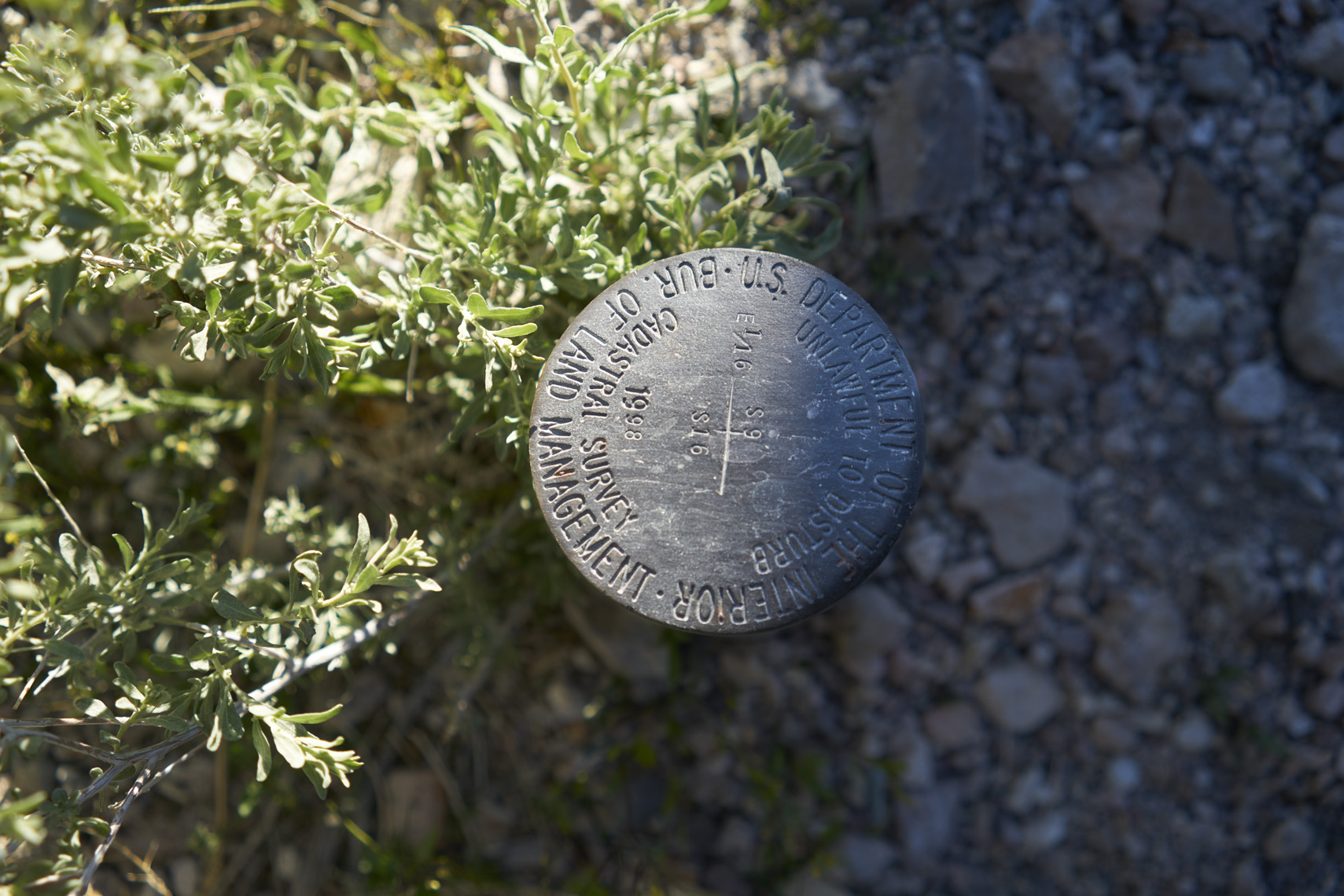 Cadastral survey benchmark pin in Rhyolite ghost town Nevada Sean Dagen Photography 