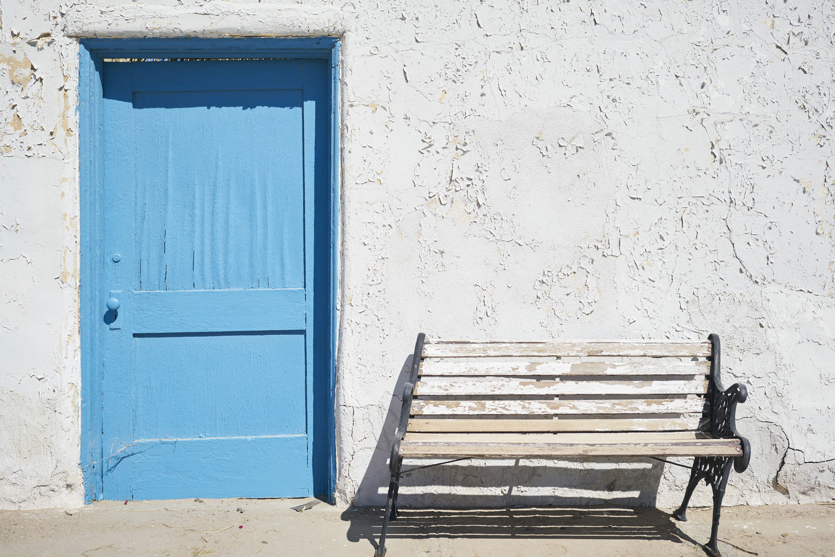 Blue door and bench at Amargosa Opera House Death Valley National Park California Sean Dagen Photography