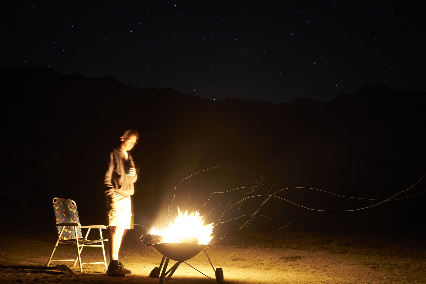 Man with fire at night in Anza-Borrego State Park California Sean Dagen Photography